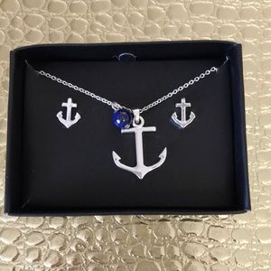 Silver-tone Anchor set, necklace measures 16”.